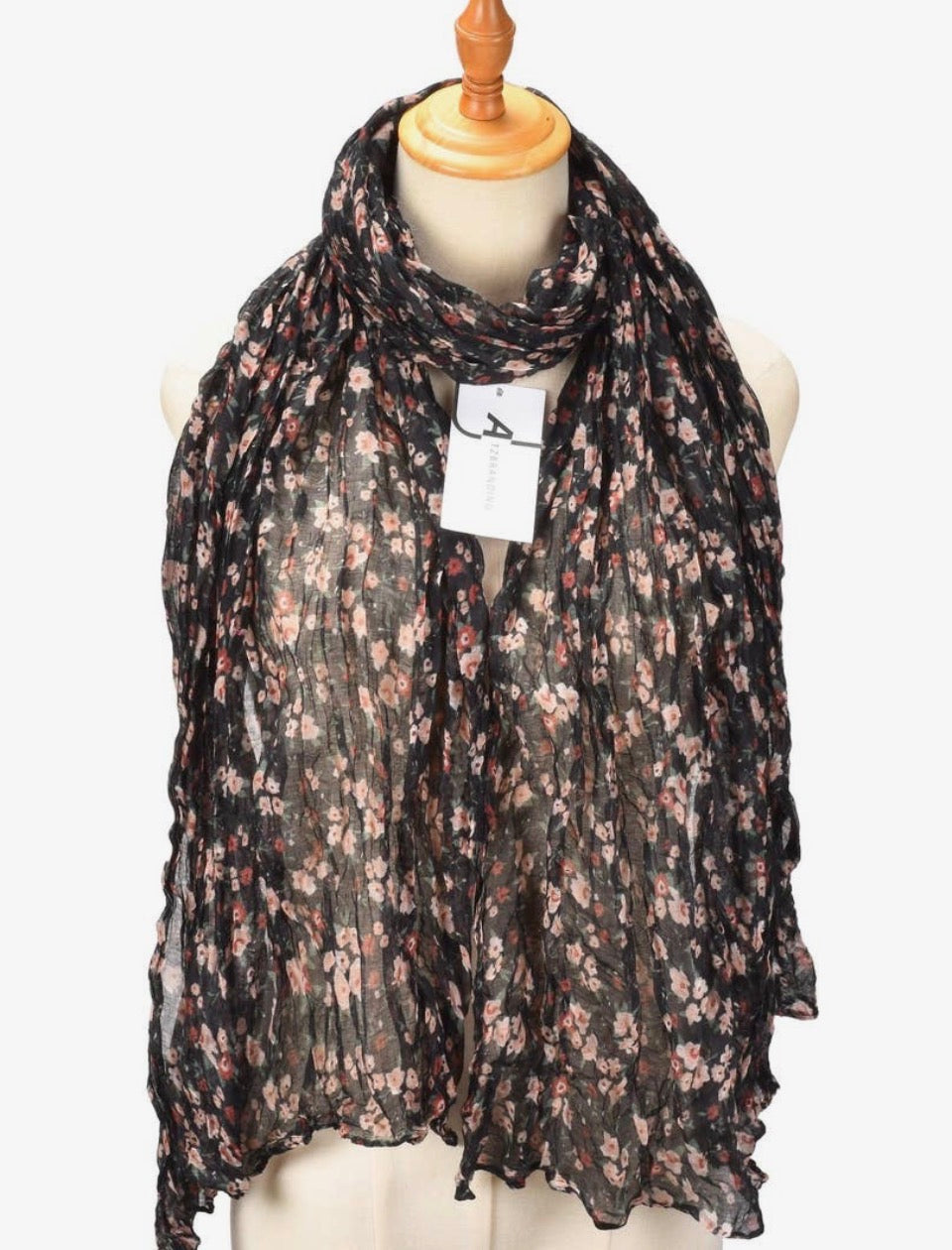 Oversized sheer ruched scarf in black with vintage blush and pink ditsy floral print, 71x31.5 inches, styled on mannequin