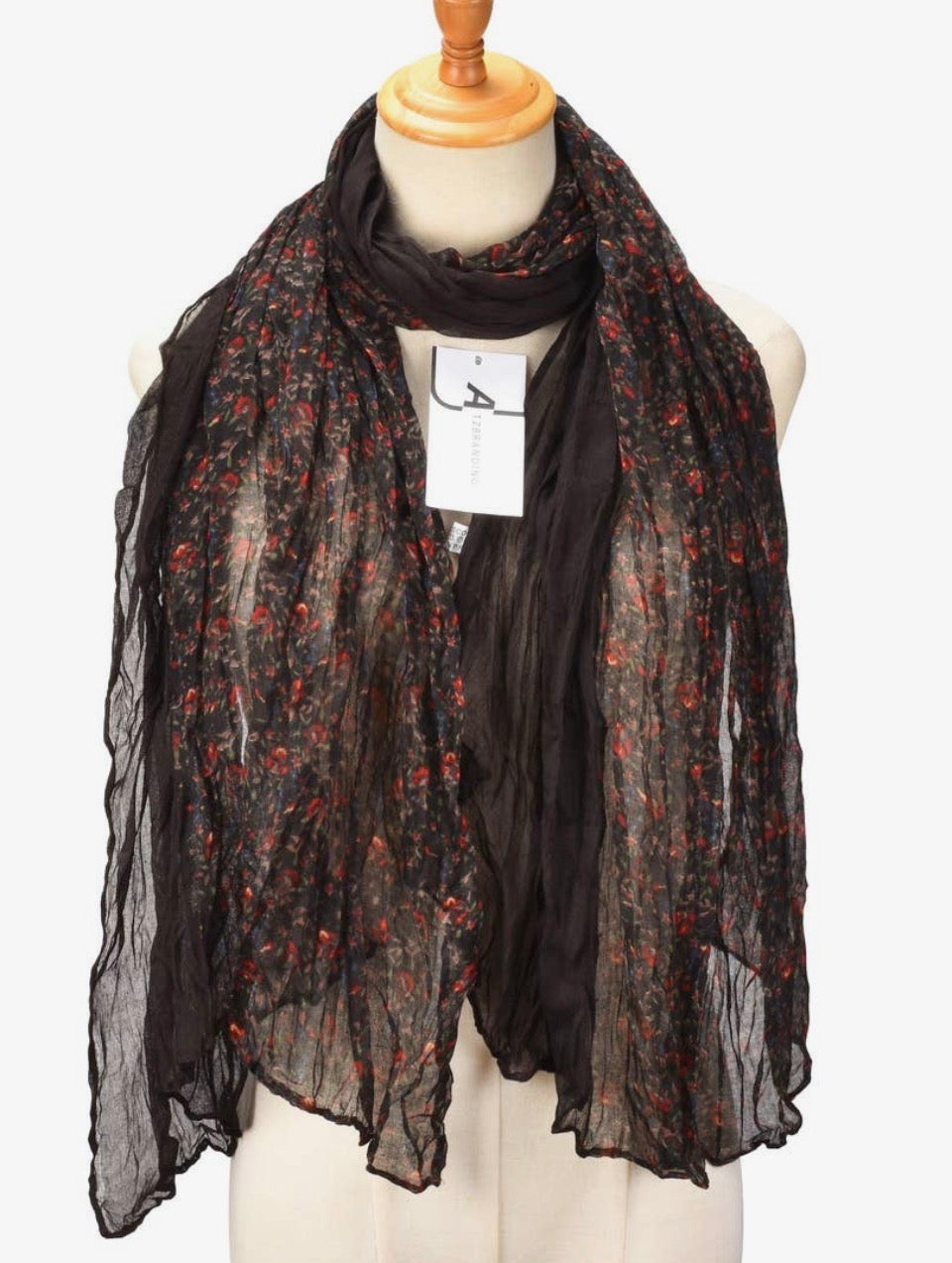 Oversized sheer ruched scarf in black with vintage ditsy red and gold floral print, 71x31.5 inches, styled on mannequin
