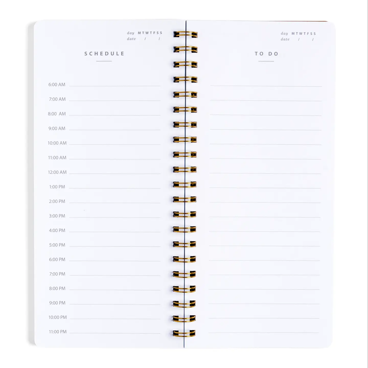 Interior pages of One Day At A Time daily planner showing hourly schedule from 6AM to 11PM on left and to-do list on right with gold spiral binding