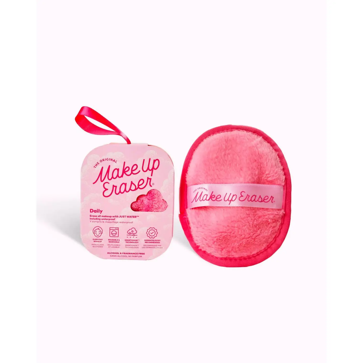 The Original MakeUp Eraser Daily in pink shown next to its gift packaging with ribbon hanger on white background