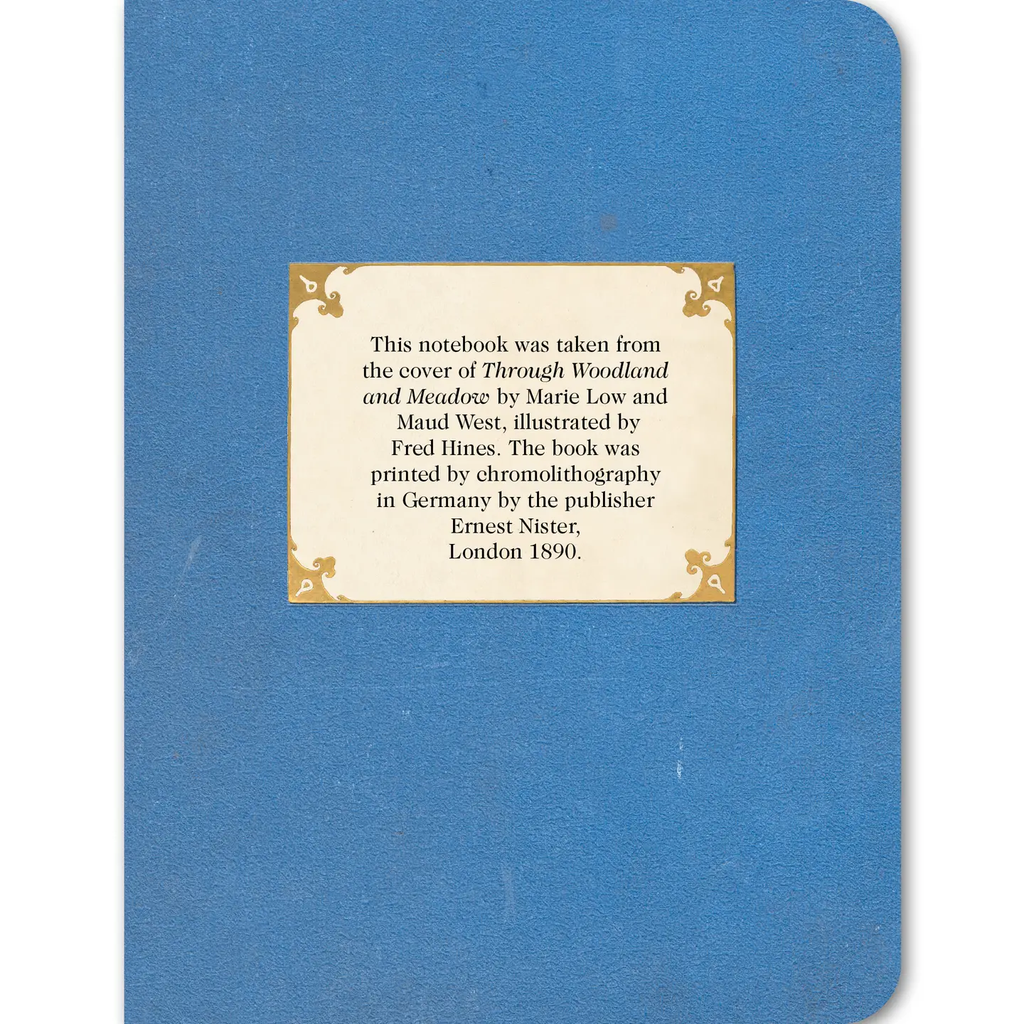 Back cover of White Roses on Blue vintage notebook showing cream label describing the design origin from Through Woodland and Meadow illustrated by Fred Hines published 1890 by Ernest Nister London